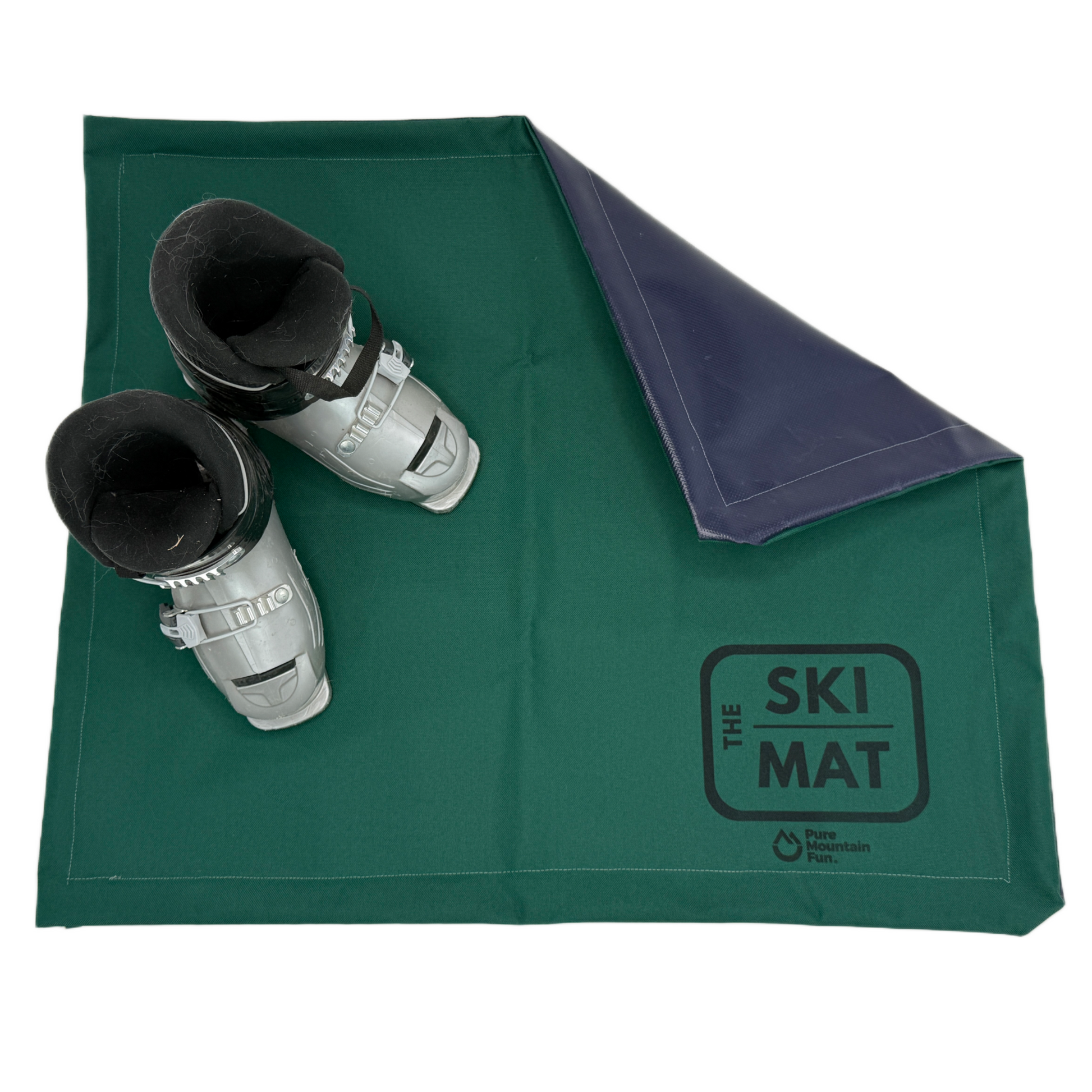 Green ski mat with ski boots on a white background