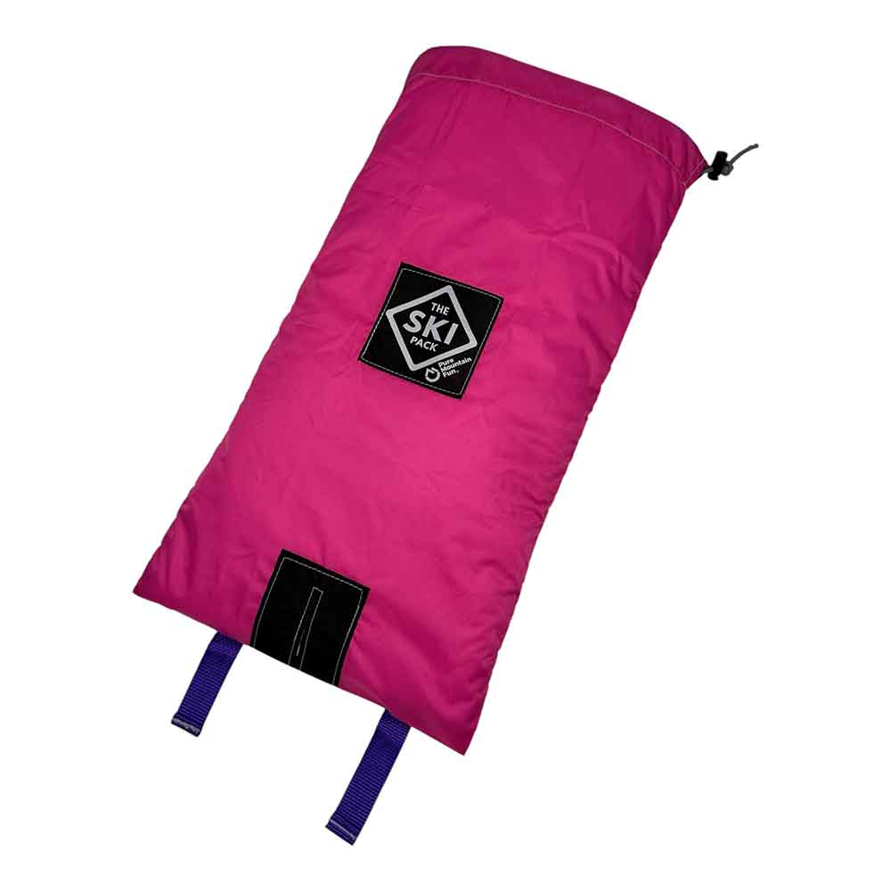 A bright pink ski boot bag with a black logo patch on the front and purple carrying straps, shown on a plain white background.