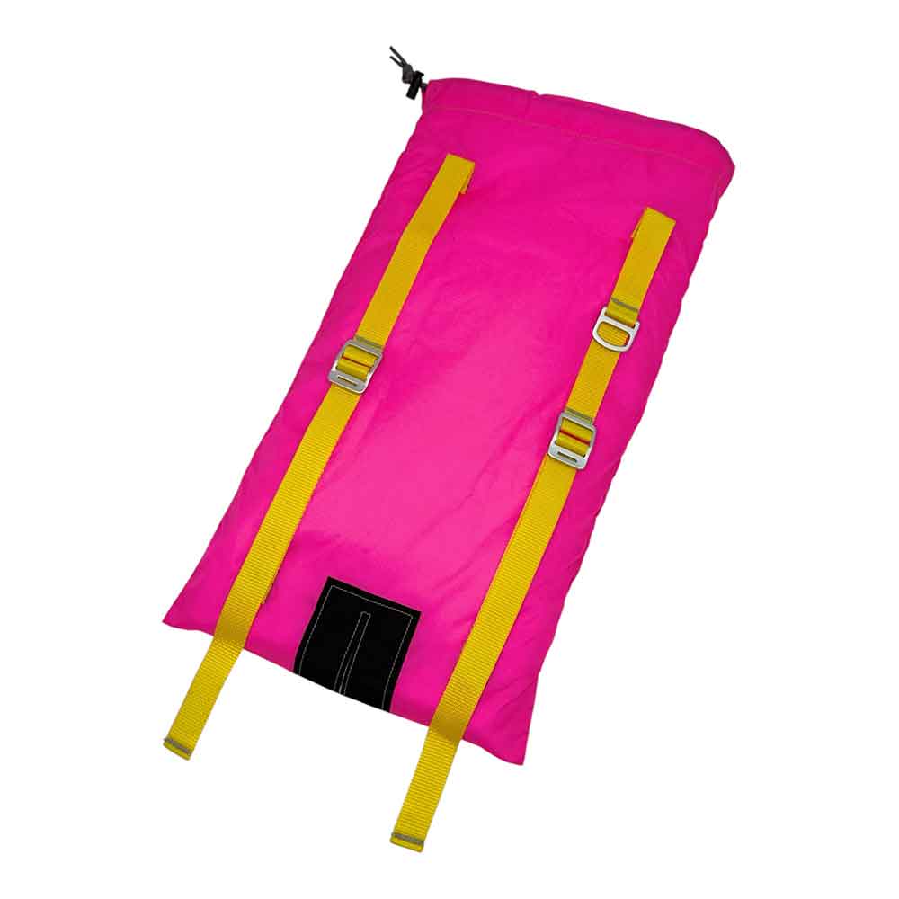 A bright pink padded bag or roll-up pouch with two wide yellow webbing straps and silver metal buckles, shown on a plain white background.