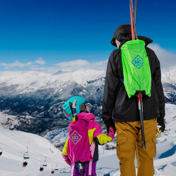 Parent and child wearing a Ski Pack 