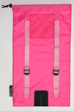 Image of pink Ski Pack fabric with light pink straps.  Features adjuster straps and d-ring for carrying ski accessories