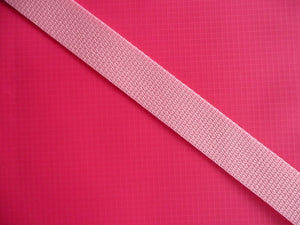 Close up of bright pink fabric and light pink strap color