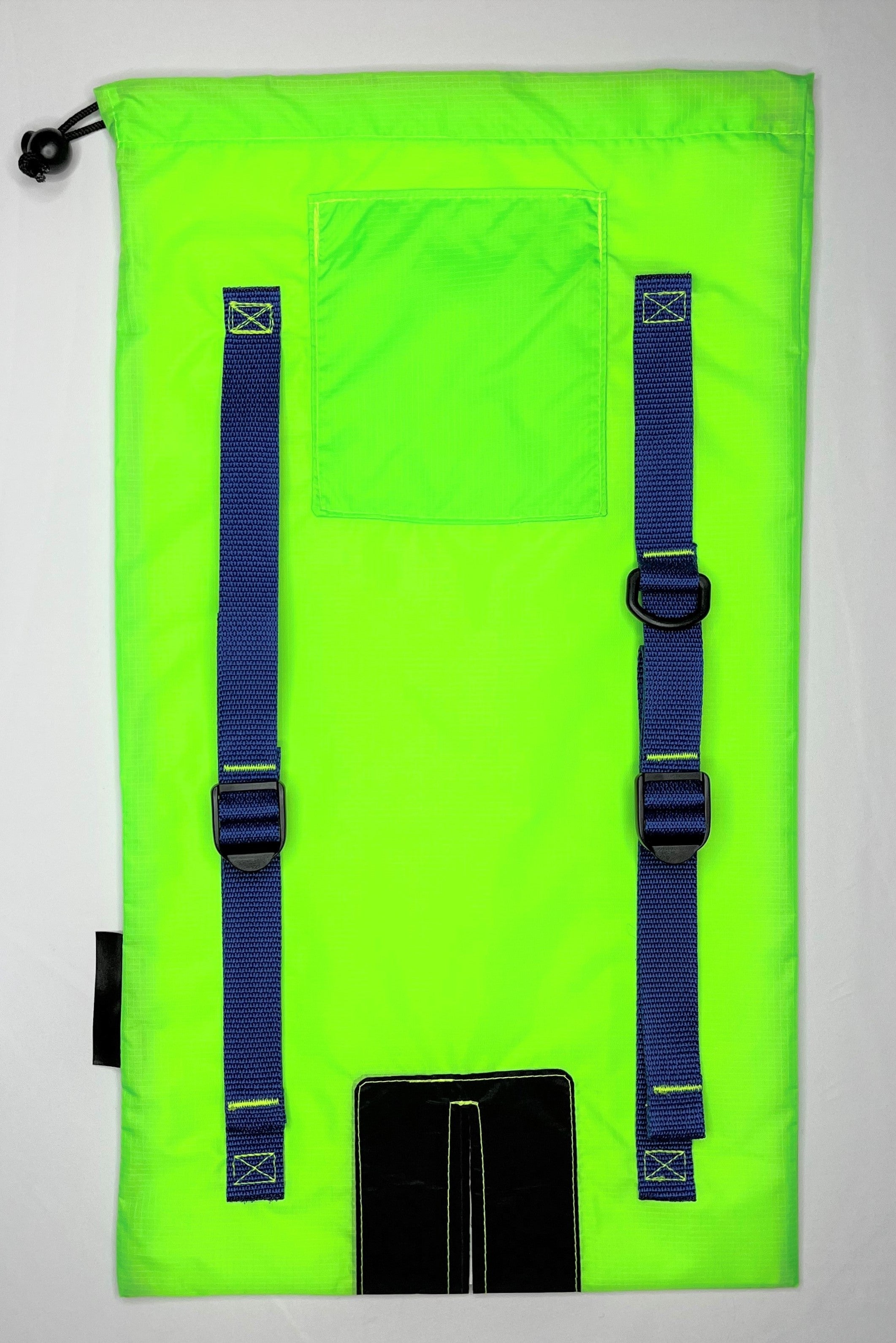 Image of green Ski Pack fabric with blue straps. Features adjuster straps and d-ring for carrying ski accessories.
