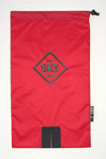 Image of red bag with dark navy Ski Pack and dark navy logo